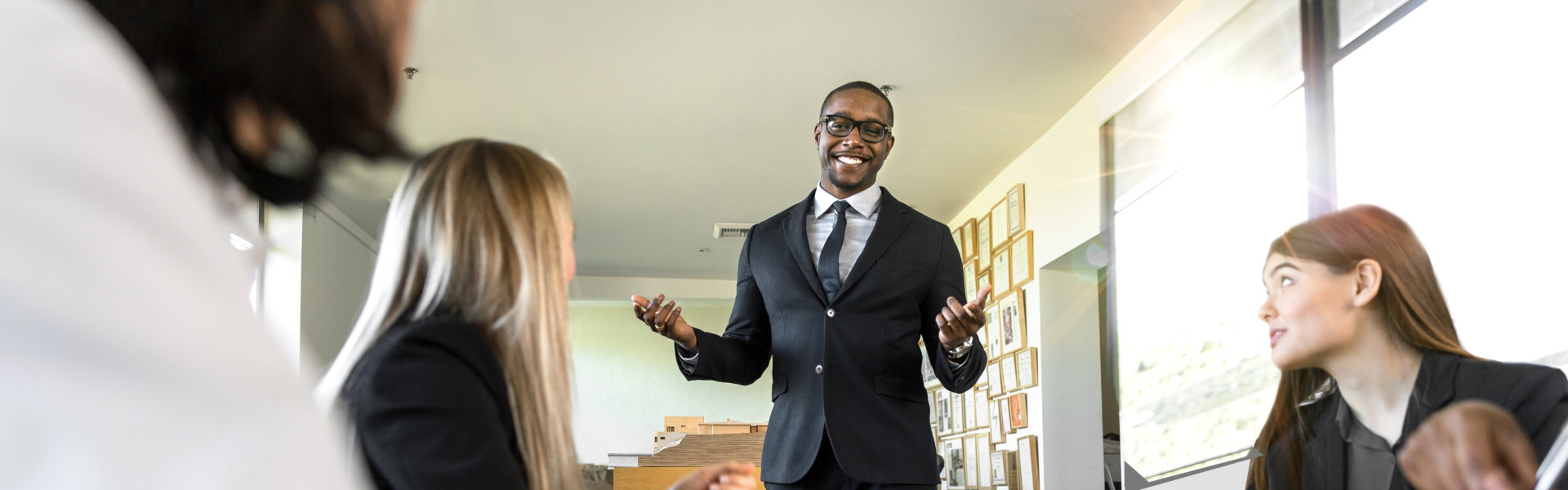 meeting table of confident businessman speaker
